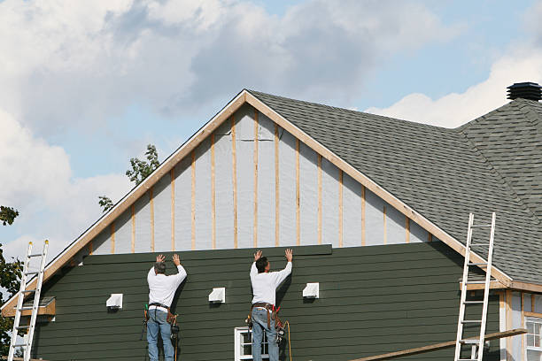 Professional Siding Installation technician working in Moyock, NC